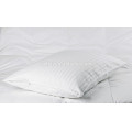 Pure white standard bed pillow core in cotton cover